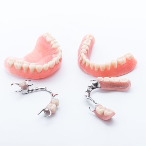 Pair of newly done partial dentures